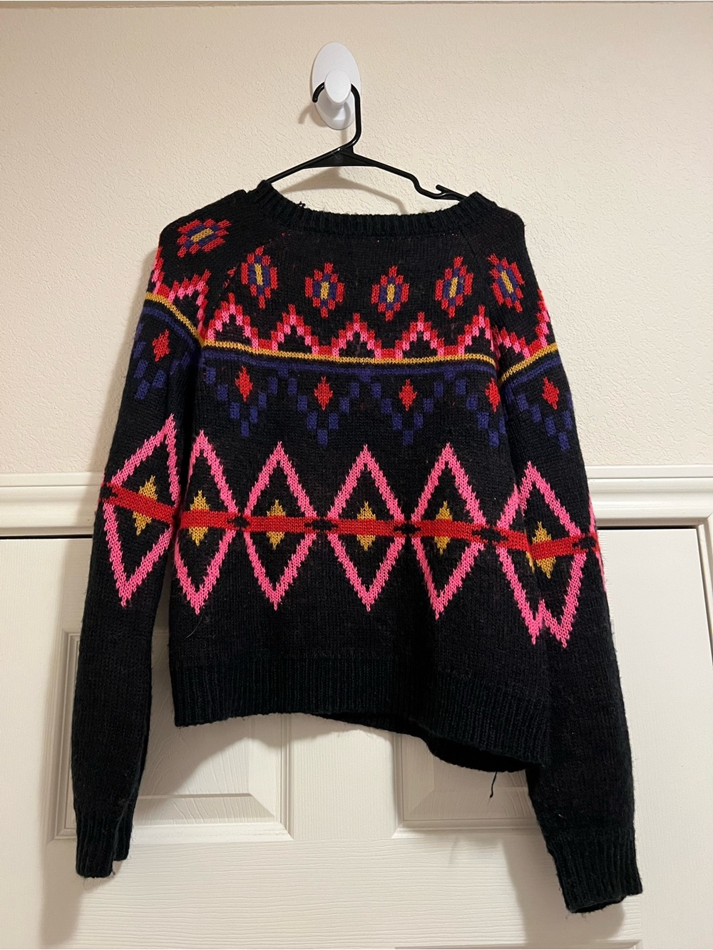 Black Geometric Fair Isle Sweater with Pink Accents